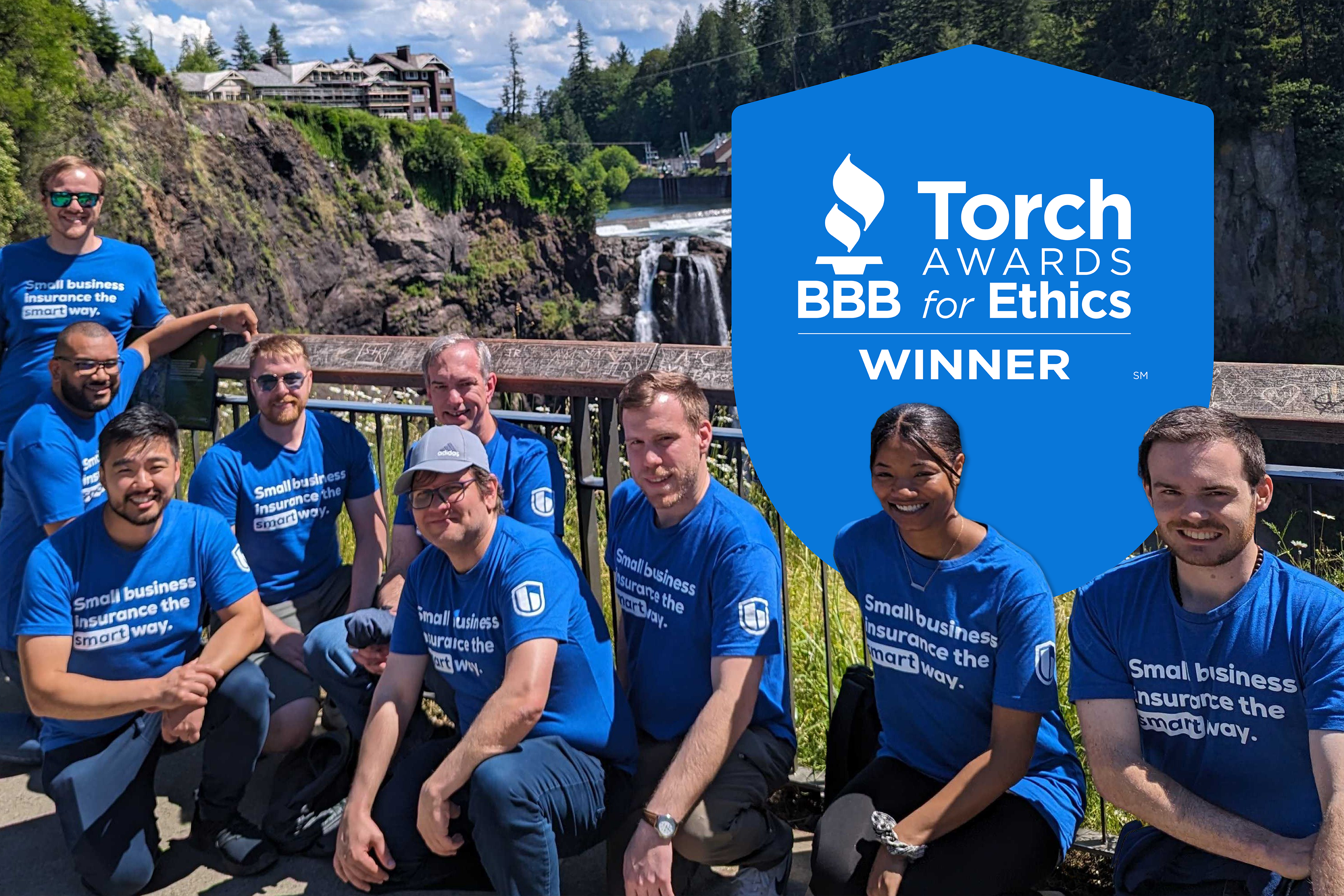 biBerk employees pose for a picture.